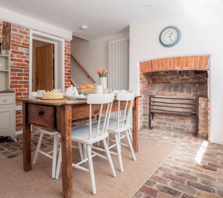 Kitchen with historic fireplace in The Coach House Deal Kent